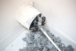 Cleaning plugged up dryer vent full of lint